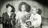 Women photographed at a ceremony