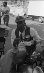 Friends feeding friends, Los Angeles, 1986