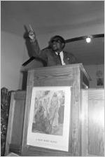 Richard Boone speaking to an audience at First Baptist Church in Eutaw, Alabama.