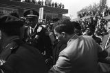 Crowd around Jacqueline Kennedy on Auburn Avenue near Ebenezer Baptist Church for Martin Luther King, Jr.'s funeral.