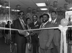 Chicken George ribbon cutting participants posing together, Los Angeles, 1985