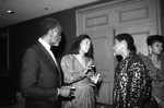 Black Emmys attendee Denise Nicholas talking with other actors, Los Angeles, 1987