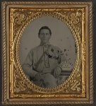 [Private Silas A. Shirley of Co. H, 16th Mississippi Infantry Regiment, with books and sign reading Victory or Death!]