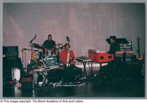 Long shot of Les McCann's band performing onstage