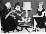 Three women drinking tea