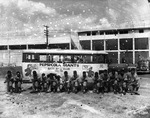 Pepsi Cola Giants baseball team pose in front of their bus