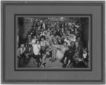 Thumbnail for Group portrait of "Hard Times" party attendees