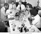 Senator Henry M. Jackson sitting with African-American reporters during a breakfast meeting, Washington, D.C., July 29, 1975