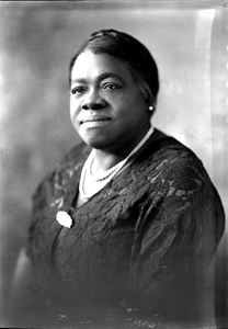 Mary McLeod Bethune, 3/4 bust, wearing dark lace dress and pearl necklace : acetate film photonegative plus one contact print