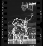 USC's basketball player Cheryl Miller tips away a rebound from California's Heli Toikka and Cynthia Cooke, 1984