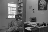 Thumbnail for John Blassingame: New York. John Blassingame seated in office, Fredrick Douglas portrait on the wall (BLJP 1-79 #101)