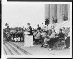 Mrs. Eleanor Roosevelt addressing the closing session of the 38th annual conference of the National Association for the Advancement of Colored People from the steps of the Lincoln Memorial in Washington, D.C.