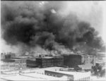 [Smoke billowing over Tulsa, Oklahoma during 1921 race massacre]