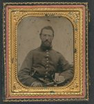 [Unidentified soldier in Union uniform with dual revolvers and sword, wearing eyeglasses]