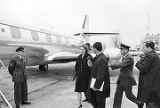 Marie Reeb (Mrs. James Reeb) talking to an NBC reporter while walking toward an airplane.