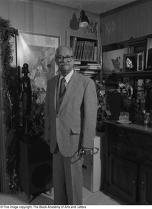 Dr. Marion J. Brooks posing for his portrait