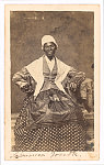 [Sojourner Truth seated with photograph of her grandson, James Caldwell of Co. H, 54th Massachusetts Infantry Regiment, on her lap]