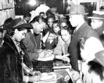 Earl Kenneth "Fatha" Hines signing autographs