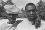 Othar Turner: Gravel Springs and Senatobia, Miss. Fife and drum. Othar and Mrs. Turner. Observers sitting in stands watching baseball game (OTP D-70 #1127)