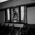 Damaged stained glass window inside 16th Street Baptist Church in Birmingham, Alabama, after the building was bombed.