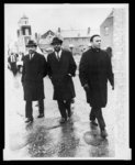 Walking in the rain to register to vote, Rev. Martin Luther King, Jr., right, Ralph Abernethy [sic], center, and Rev. Andrew Young lead group of Negroes from church here on walk to Dallas Co. courthouse