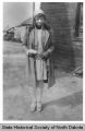 Era Bell Thompson in dress and heels, Bismarck, N.D.