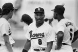 Bo Jackson with teammates during a Birmingham Barons baseball game in Birmingham, Alabama.