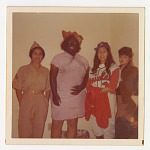 Four women in Halloween costumes