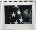 Young boy with American flag