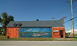 Mural depicting the USS Cairo Civil War-era ironclad warship in Cairo (pronounced CARE-o), Illinois, a small city at the southern tip of the state, wedged between Kentucky and Missouri. Once a booming river town of 15,000 population in the early 20th Century, Cairo declined into what some call a ghost town one-fifth the population a century later following several racially tinged riots and severe flooding, including one in 2011 in which the entire city was evacuted