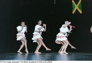 Dance troupe performing at Ashe Caribbean event