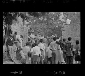 View of speakers, most likely Black community leaders or activists, at Black student rally in Franklin Park