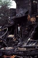 Riots; Detroit; Race Riot.--Man in doorway of burned bldg. Name not used.--Used in “A Time of Tragedy”. A special section, Re: Riot. Published by Det. News Aug. 11, 1967.--Enc. 1 neg.