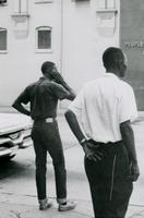 Men walking on Main Street, Farmville, Va., July 1963. #004