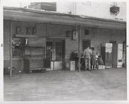 Mississippi State Sovereignty Commission photograph of a male and female standing near the rear entrance to Stanley's Cafe, Winona, Mississippi, 1961 November 1