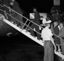 Freedom Riders boarding an Eastern Air Lines flight to New Orleans at the airport in Birmingham, Alabama.