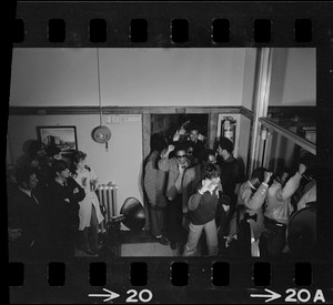 The Boston State College Black student protesters marched out of the occupied room with their arms raised in the Black Power salute