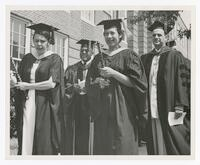 Two Unidentified Women Lead Procession at Commencement, 1953