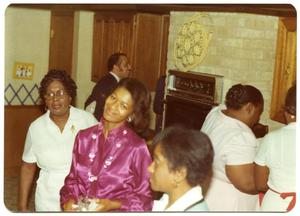 Women in Kitchen at Christmas Party