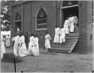 African Americans processing to a baptism