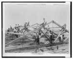 [Students constructing roof for the Collis P. Huntington Memorial building at Tuskegee Normal and Industrial Institute]