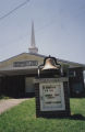 Macedonia Baptist Church: view of church front, marquee sign, and bell