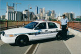 Police Officer With Cruiser