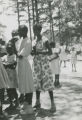 Students, probably from Camden Academy in Wilcox County, Alabama, in line to get Coca-Colas provided by the company.