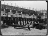 Applying staff to walls in the Electricity palace courtyard