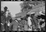 Negroes shooting craps behind tenant house, disposing of their cotton money on Saturday afternoon, Marcella Plantation, Mileston, Mississippi Delta, Mississippi