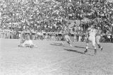 Thumbnail for Football teams playing on the field during the Turkey Day Classic, the annual football game held in Montgomery, Alabama, between Alabama State College and Tuskegee Institute.