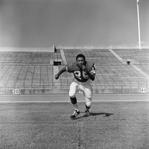 Football player running in his uniform, 2