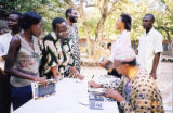 Eugene Redmond signing "Drumvoices Revue"