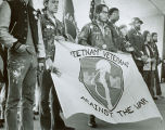 Men holding flag